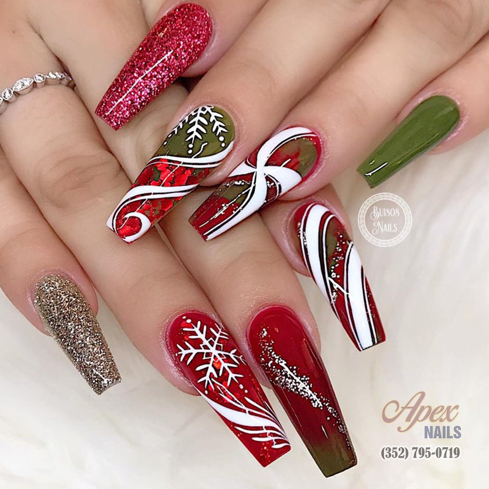 Nail technician painting a client’s nails